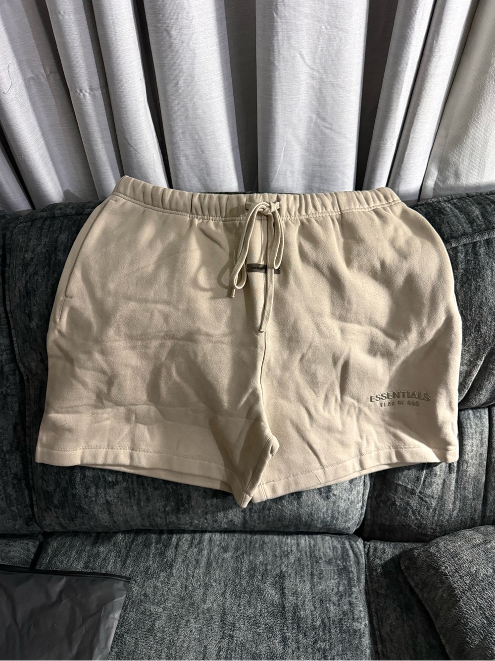 ESSENTIALS Fear of God Fleece Drawstring Shorts in Timber